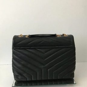YSL SIGNATURE-KIT – LOULOU-TASCHE & OPYUM-SANDALE